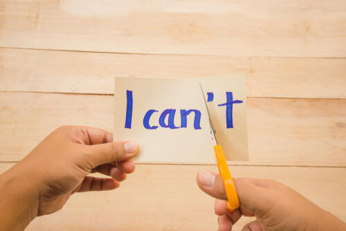 Cutting the "t" out of "I can't" so it says "I can"